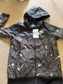 NWT youth size medium Nike full zip wind breaker jacket.