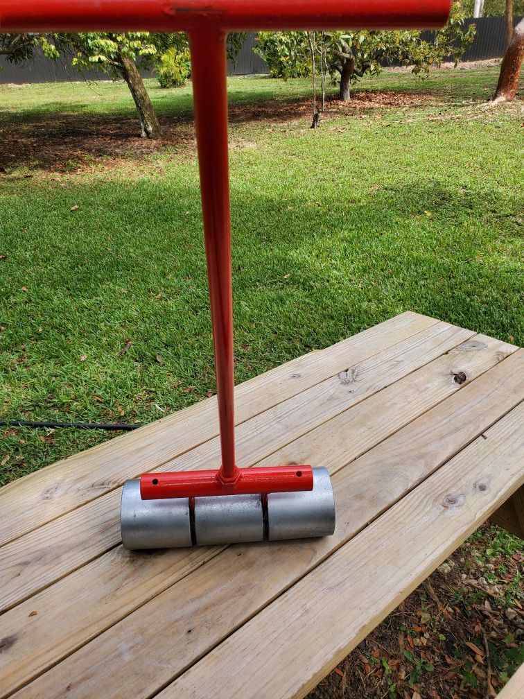 Heavy duty 100 lb. Vinyl, Linoleum and Carpet Floor Roller with Segmented Rollers retails for 400+