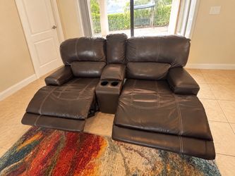 Dark Gray Leather Manual Reclining Couch and Loveseat with Center Console