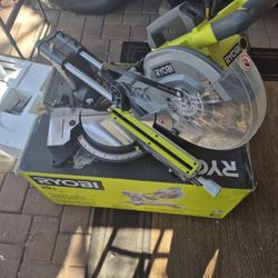 RYOBI SLAITYNNG MITER SAW 10 INCH NEW CONDITIONS 
