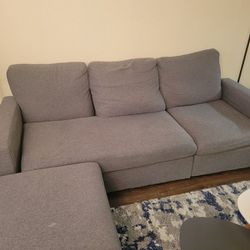 Gray Couch And Ottoman