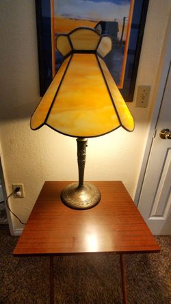 Antique miller lamp. Located in wasco