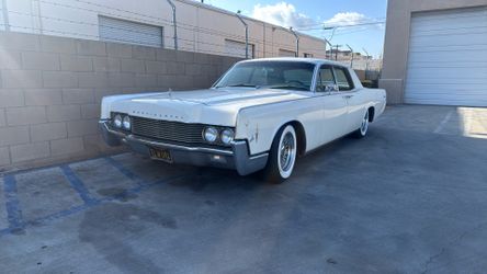 1966 Lincoln continental sucide doors