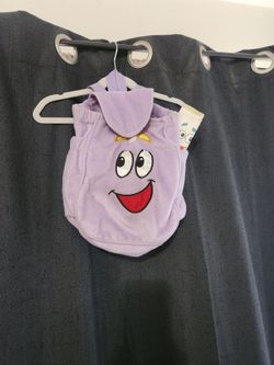 Purple plush Dora the Explorer backpack.