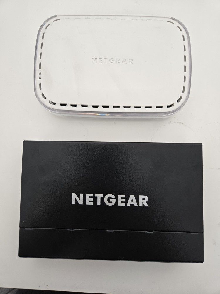 2x Netgear Switches With Power Supply