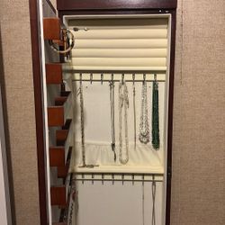 Jewelry cabinet with mirror