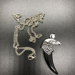 Silver Eagle Head And Black Claw Pendant