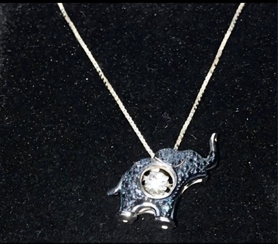 Kay Jewlers 925 Silver Elephant Necklace With Blue Diamonds Outside And A Perpetural Moving Diamond Center