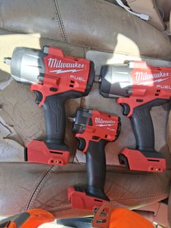 TWO 1/2IN M18 HIGH TORQUE IMPACTS and  ONE 3/8IN M18 IMPACT