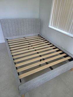 Gray Upholstered Bed Frame with Slatted Base $125