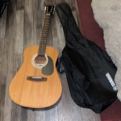 Guitar With The Yamaha Case