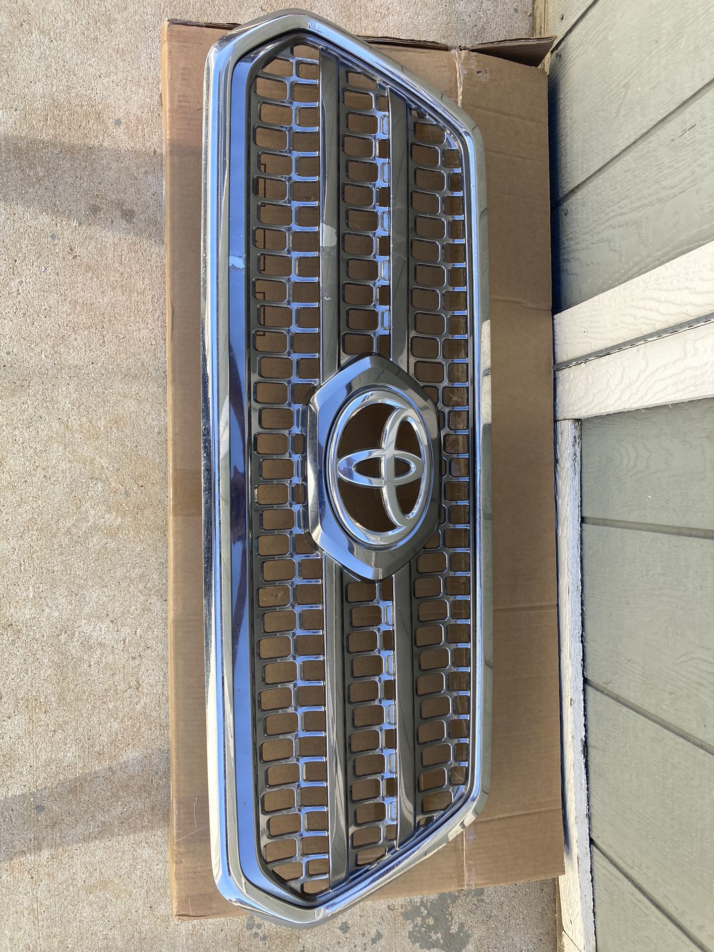OEM 2016-2019 Toyota Tacoma Front Chrome Grille and Surround 