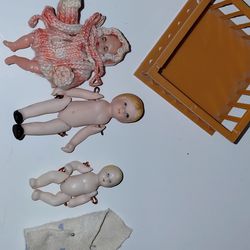 Tiny vintage porcelain dolls.
