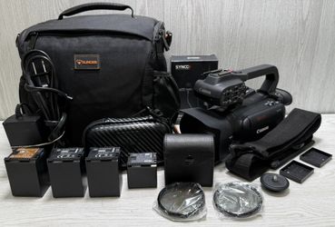 Canon XA40 4K UHD Professional Camcorder Bundle With Batteries And Case (A1G013330)