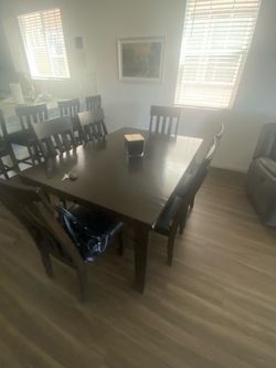Dining room table and 8 chairs
