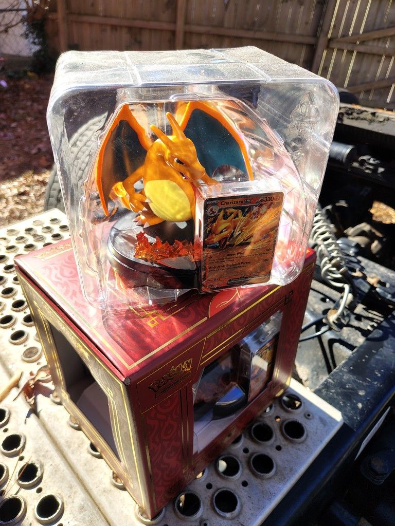 Pokemon Charizard Collectible Figurine & Rare card