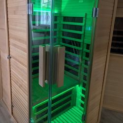 Single sauna room made of Canadian Hemlock the light changes color
