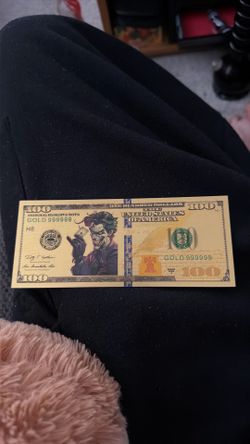 Gold joker 100 dollar bill
