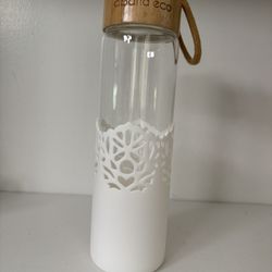 apana Eco Glass Water Bottle With White Silicone Sleeve And Wood Top 