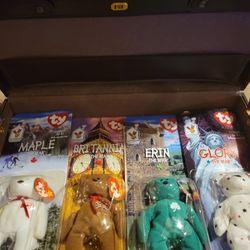 TY beanie babies - international bears. Set of 4 in box factory sealed.