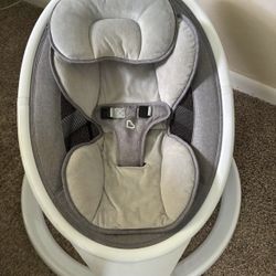 Munchkin Lightweight Baby Swing with Natural Sway in White. 