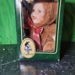 Geppeddo Buster Bear Porcelain Doll – New in Box