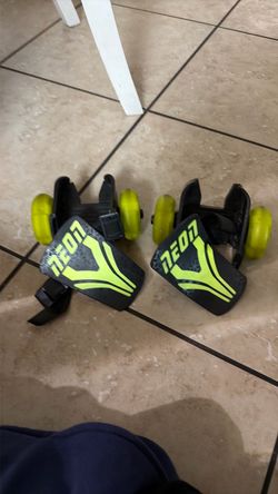 Neon heel strap rollers