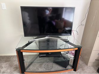 Glass and wood TV stand
