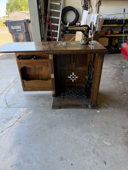 Vintage Franklin Sewing Machine with Cabinet And Attachments.