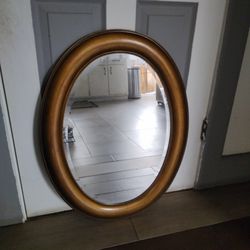 Oval Shaped Mirror.   29"L x. 23"W