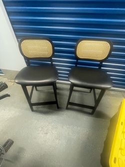 2 black wood bar stools