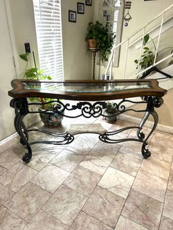 Consol iron table glass top removable  and marble in down 65” long 22” deep  34” height