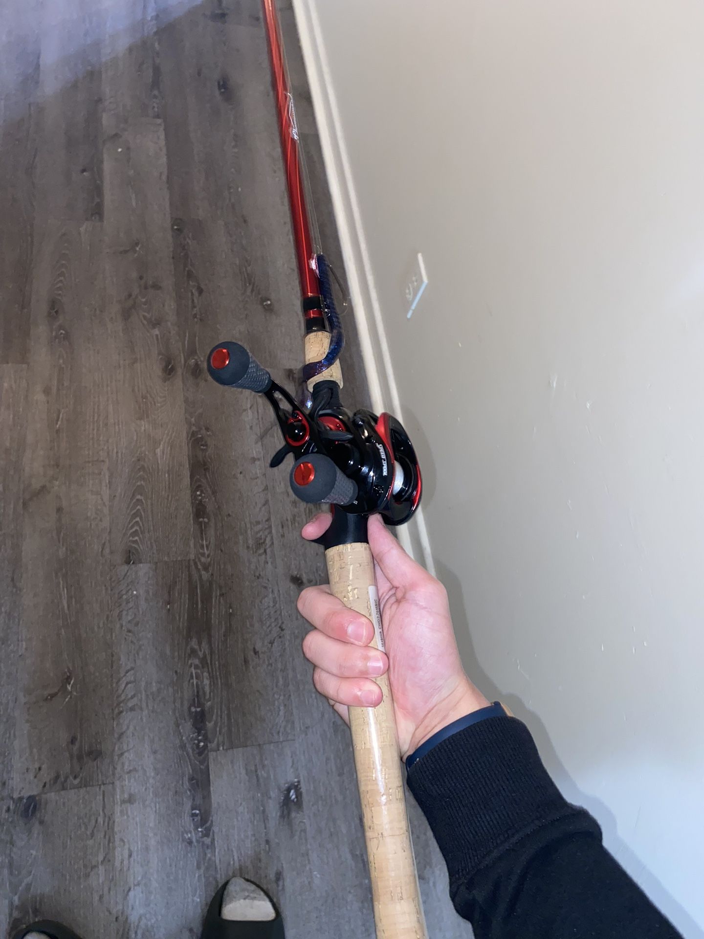 Carbon Fire Lews Bait caster Used Once With Berkeley Cherrywood Rod