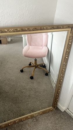 Mirror with detailed frame
