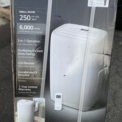 LG 6,000 BTU (DOE) 115-Volt Portable Air Conditioner LP0621WSR Cools 250 Sq. Ft. with Dehumidifier Function and LCD Remote