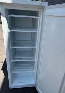 Household upright freezer great for garage