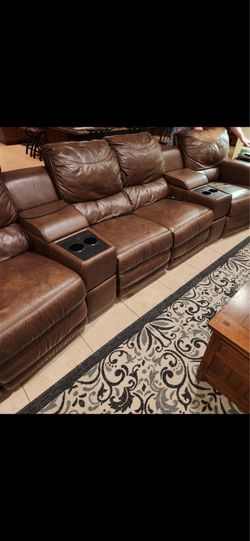 Brown leather recliner sofa