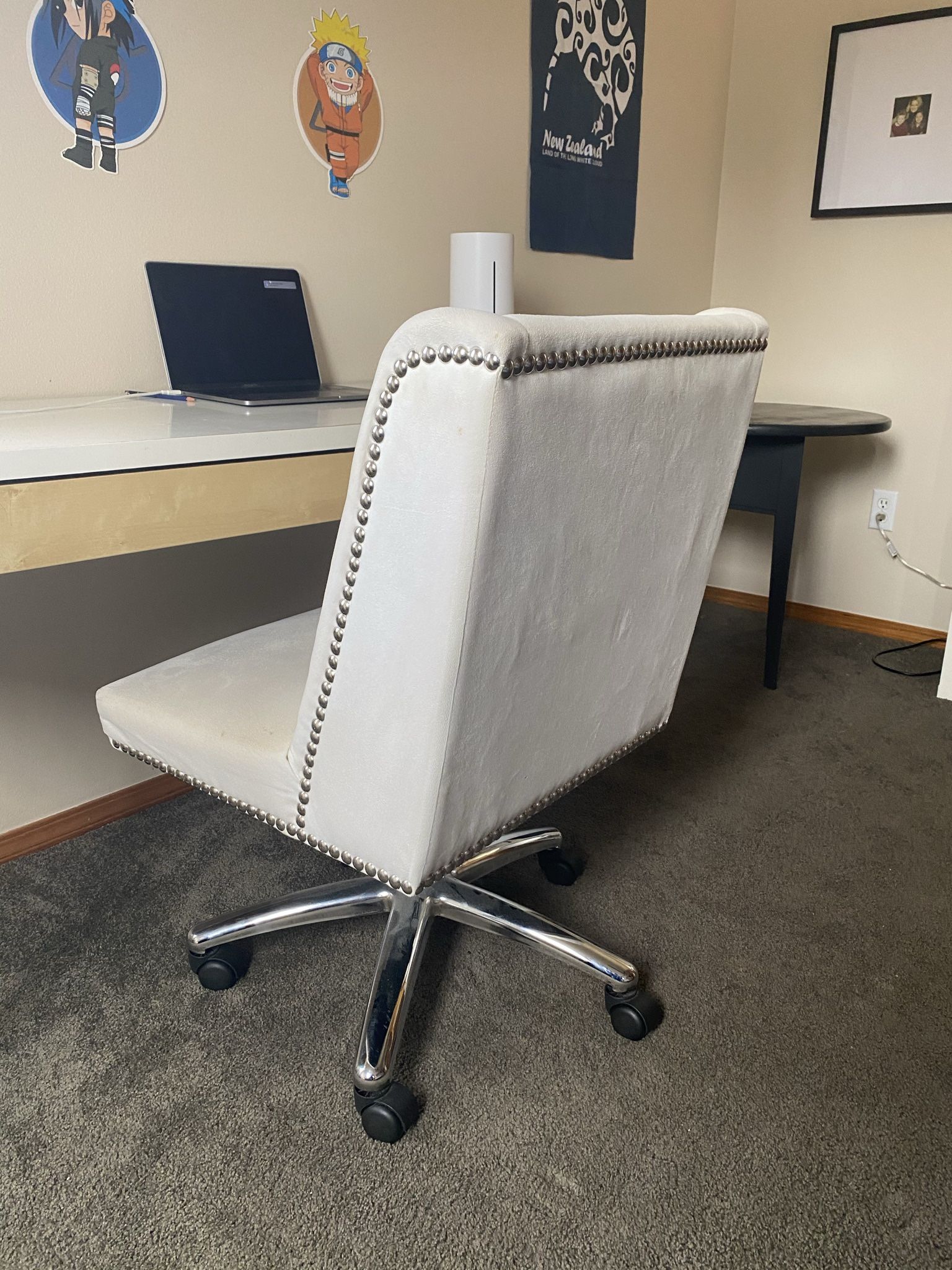 Creamy white very comfortable desk chair.