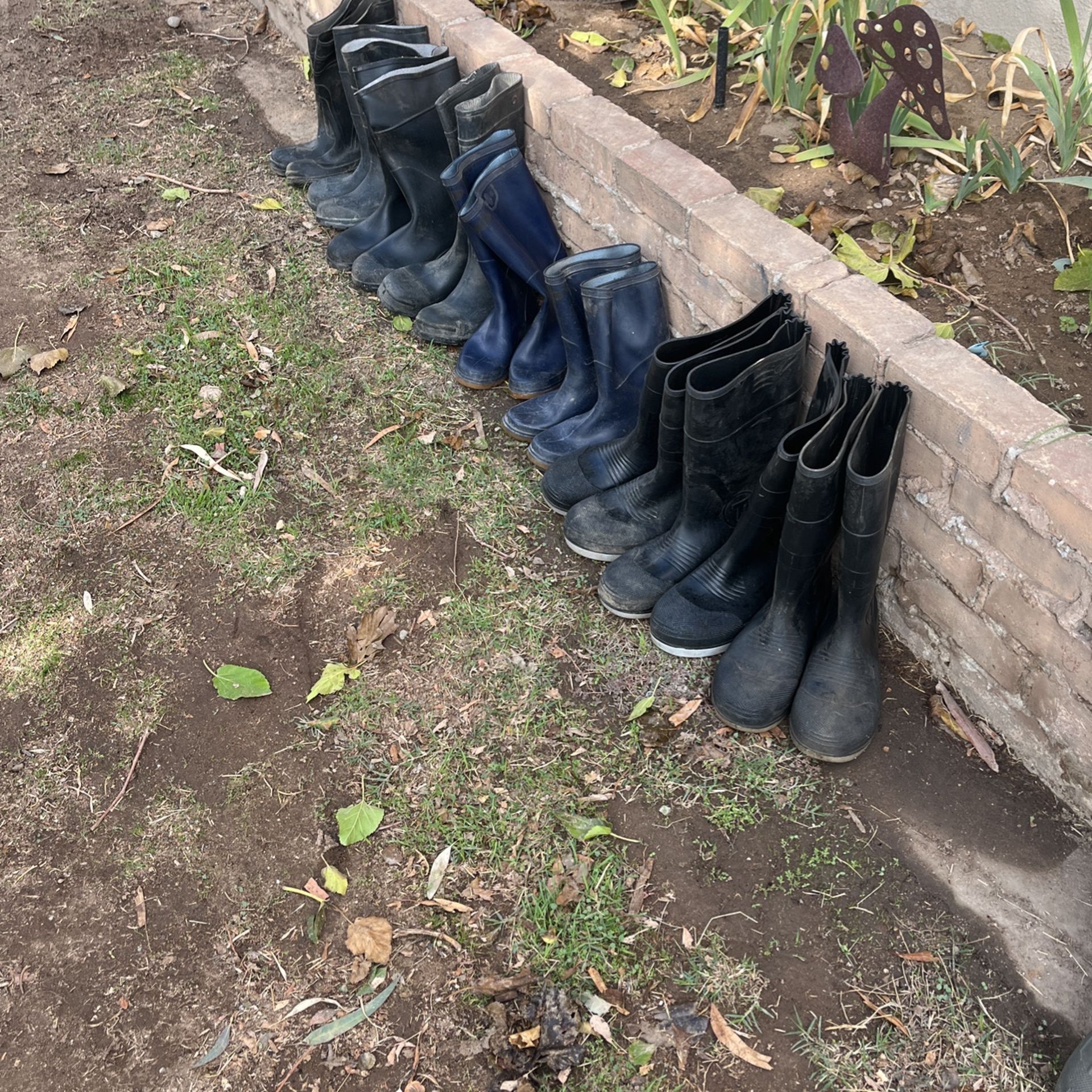 Men’s and women’s rubber boots ranging in sizes some used some new