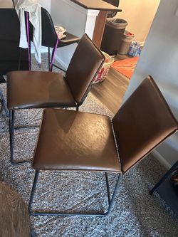 Brown tall island chairs