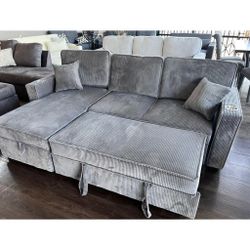 dark gray corduroy sectional sofa with storage chaise and pull out bed