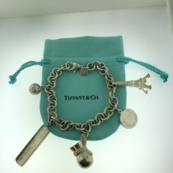 Tiffany & Co Sterling Silver 5 Charm Bracelet RARE!! A Retired Piece Vintage