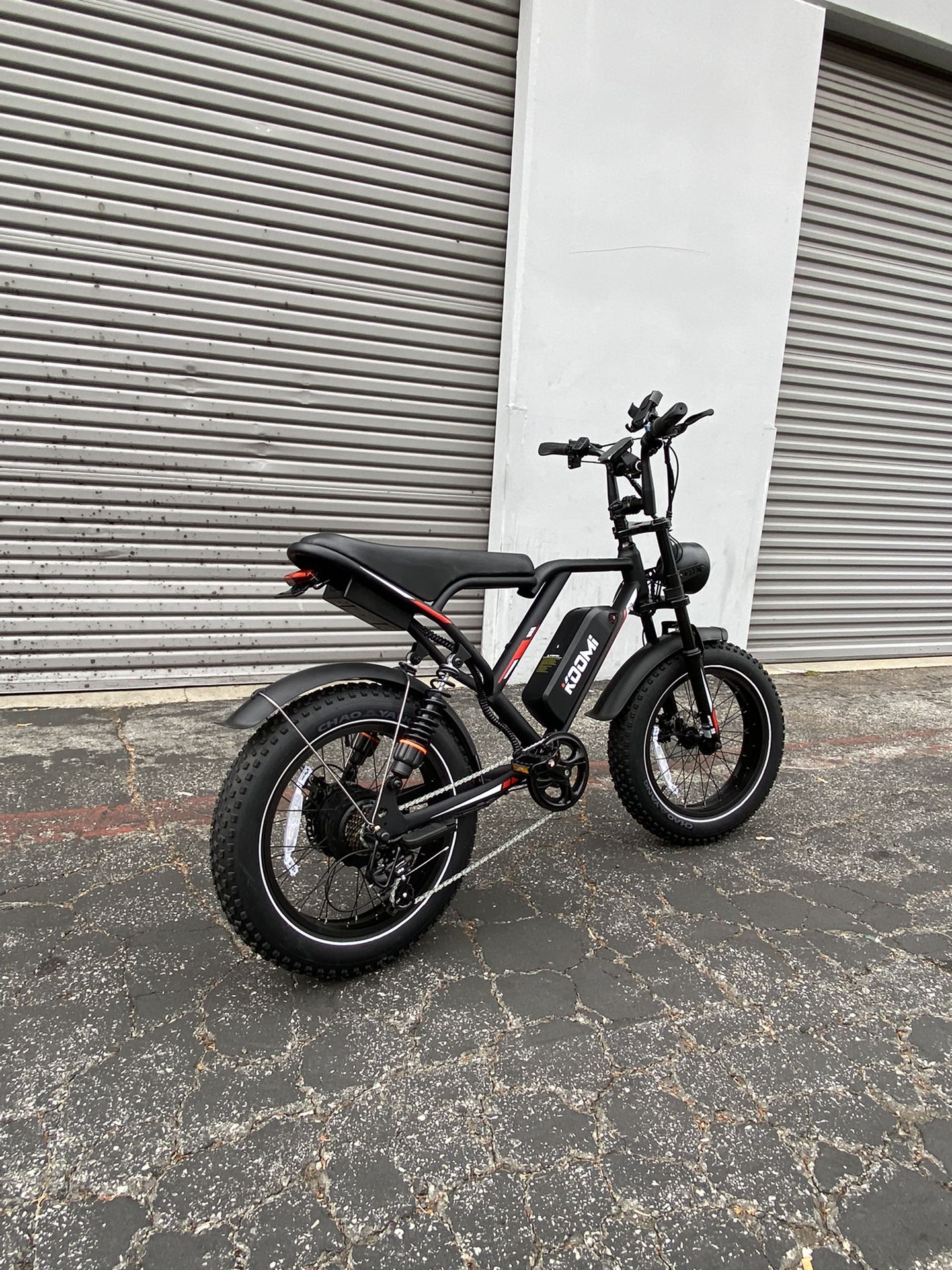 Brand new in box, e-bike 750w 48v 17.5ah, top speed 28 mph. Full suspension, with chain lock, phone holder, foot pegs,  electric bike  