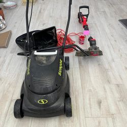 Lawn Mower, Extension Cord, And Weed Eater