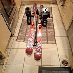 180cm Salomon Skis New Boots Mondo 27. Poles And Helmet Xl