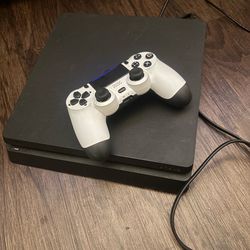 PS4 and 2 controllers