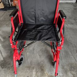Drive wheel chair w leg rests red in color