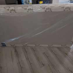 BRAND NEW TWIN box spring with bed frame. 