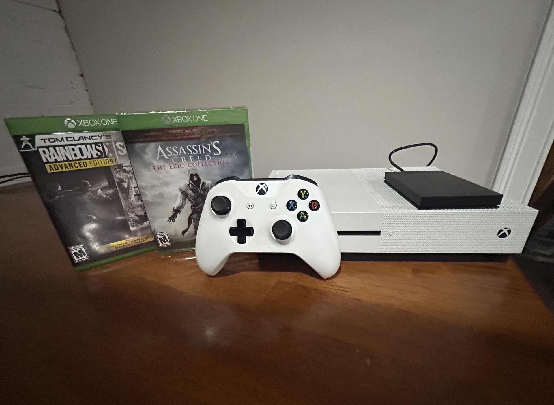 X Box One S + 2TB Hard Drive + Assassin’s Creed & Rainbow Six