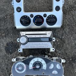 Toyota FJ cruiser dashboard items cluster head unit stereo ac control panel trim 